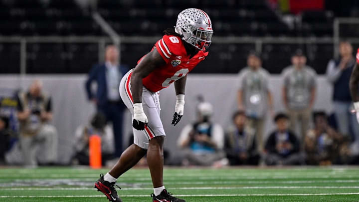 Dec 31, 2025; Arlington, TX, USA; Ohio State Buckeyes linebacker Arvell Reese (8) gets into position during the 2025 Cotton Bowl and quarterfinal game of the College Football Playoff at AT&T Stadium. Mandatory Credit: Jerome Miron-Imagn Images