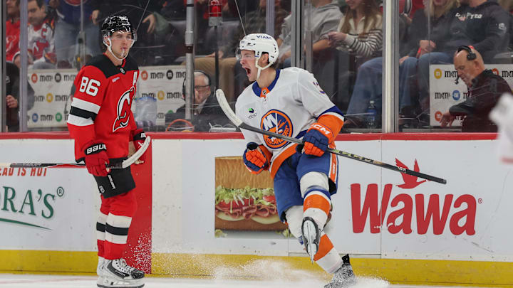Nov 10, 2025; Newark, New Jersey, USA; New York Islanders center Mathew Barzal (13) celebrates his game winning goal against the New Jersey Devils during overtime at Prudential Center. Mandatory Credit: Ed Mulholland-Imagn Images