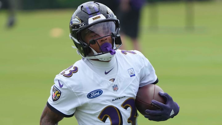 Baltimore Ravens cornerback Jaire Alexander (23) runs drills during training camp at the Under Armour Performance Center.