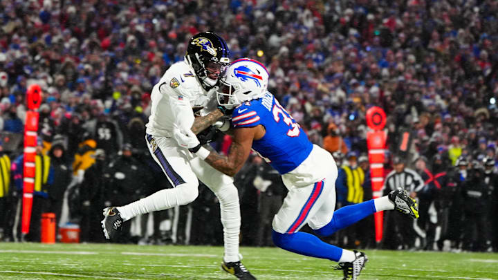 Jan 19, 2025; Orchard Park, New York, USA; Baltimore Ravens wide receiver Rashod Bateman (7) makes a catch against Buffalo Bills cornerback Rasul Douglas (31) during the second quarter in a 2025 AFC divisional round game at Highmark Stadium. Mandatory Credit: Gregory Fisher-Imagn Images Jan 19, 2025; Orchard Park, New York, USA; Baltimore Ravens wide receiver Rashod Bateman (7) makes a catch against Buffalo Bills cornerback Rasul Douglas (31) during the second quarter in a 2025 AFC divisional round game at Highmark Stadium. Mandatory Credit: Gregory Fisher-Imagn Images