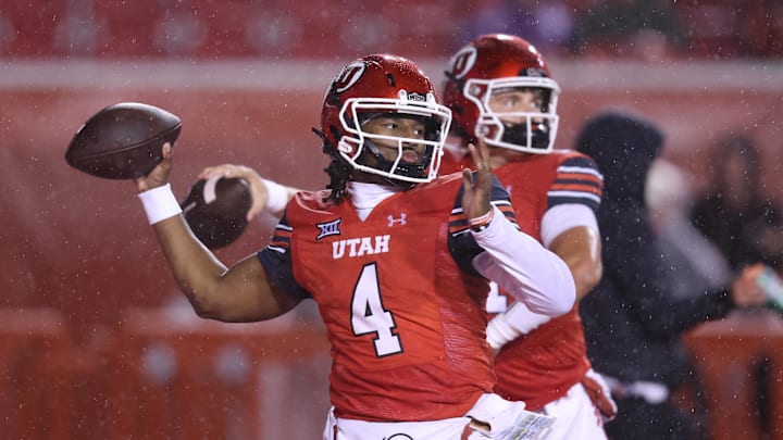 Utah Utes quarterback Devon Dampier (4) warms up before the game at Rice-Eccles Stadium.