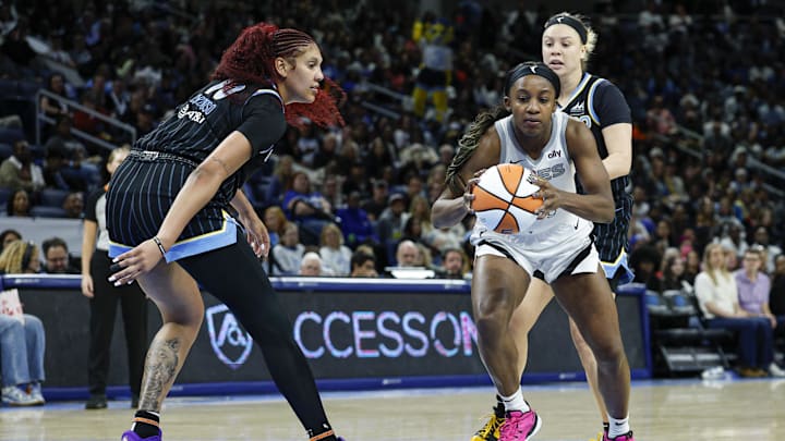 Aug 25, 2025; Chicago, Illinois, USA; Las Vegas Aces guard Jackie Young (0) drives to the basket against the Chicago Sky during the second half at Wintrust Arena. Mandatory Credit: Kamil Krzaczynski-Imagn Images