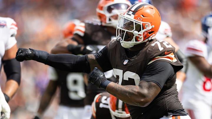 Sep 22, 2024; Cleveland, Ohio, USA; Cleveland Browns defensive tackle Quinton Jefferson (72) celebrates his tackle for a loss of yardage against the New York Giants during the second quarter at Huntington Bank Field. Mandatory Credit: Scott Galvin-Imagn Images