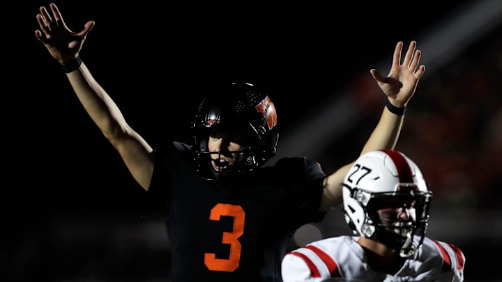 West De Pere quarterback Patrick Greisen (3) celebrates a touchdown versus Pulaski during a Fox River Classic Conference (North Division) game on Sept. 19, 2025.