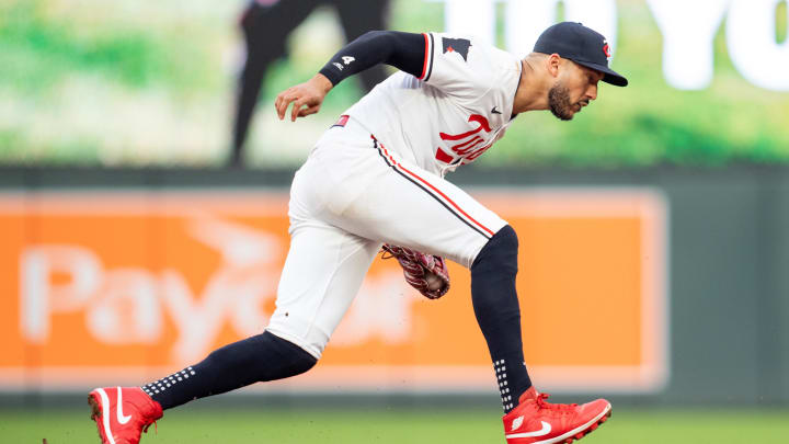 Jul 2, 2024; Minneapolis, Minnesota, USA; Minnesota Twins shortstop Carlos Correa (4) fields a ground ball hit by Detroit Tigers catcher Jake Rogers (34) in the seventh inning at Target Field. Mandatory Credit: Matt Blewett-USA TODAY Sports