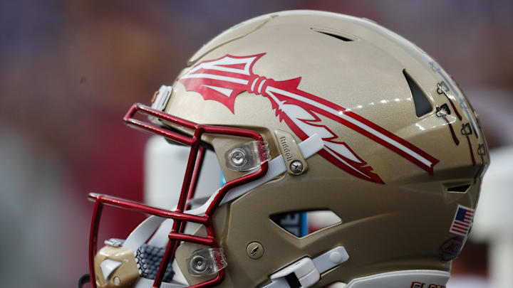 Nov 4, 2023; Pittsburgh, Pennsylvania, USA; A Florida State Seminoles helmet on the sidelines against the Pittsburgh Panthers during the second quarter at Acrisure Stadium. Mandatory Credit: Charles LeClaire-Imagn Images Nov 4, 2023; Pittsburgh, Pennsylvania, USA; A Florida State Seminoles helmet on the sidelines against the Pittsburgh Panthers during the second quarter at Acrisure Stadium. Mandatory Credit: Charles LeClaire-Imagn Images