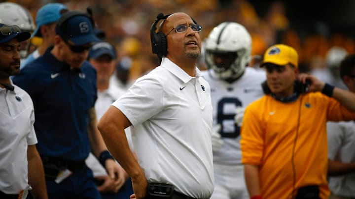 Penn State Nittany Lions football coach James Franklin looks up at the big screen after a play in the third quarter against Iowa at Kinnick Stadium.