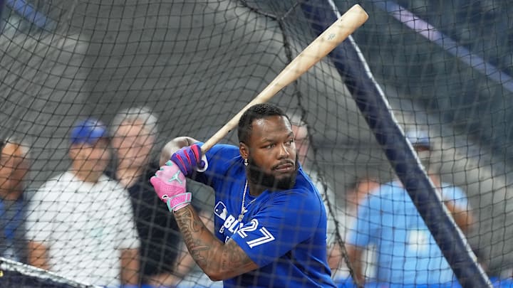 Aug 12, 2025; Toronto, Ontario, CAN; Toronto Blue Jays first baseman Vladimir Guerrero Jr. (27) takes batting practice before a game against the Chicago Cubs at Rogers Centre. 