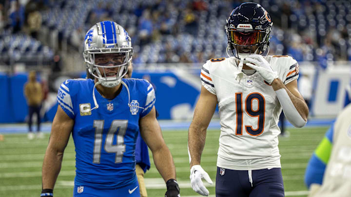 Nov 19, 2023; Detroit, Michigan, USA; Detroit Lions wide receiver Amon-Ra St. Brown (14) and his brother Chicago Bears wide receiver Equanimeous St. Brown (19) in warms up at Ford Field. Mandatory Credit: David Reginek-Imagn Images