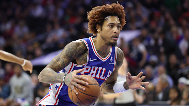 Nov 11, 2025; Philadelphia, Pennsylvania, USA; Philadelphia 76ers guard Kelly Oubre Jr. (9) drives against the Boston Celtics during the third quarter at Xfinity Mobile Arena. Mandatory Credit: Bill Streicher-Imagn Images Nov 11, 2025; Philadelphia, Pennsylvania, USA; Philadelphia 76ers guard Kelly Oubre Jr. (9) drives against the Boston Celtics during the third quarter at Xfinity Mobile Arena. Mandatory Credit: Bill Streicher-Imagn Images