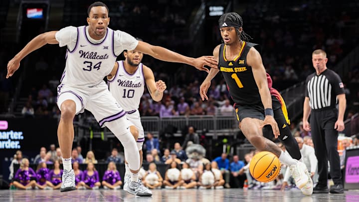 Arizona State Sun Devils guard Alston Mason (1) brings the ball up court around Kansas State Wildcats center Ugonna Onyenso (34) during the second half at T-Mobile Center. Arizona State Sun Devils guard Alston Mason (1) brings the ball up court around Kansas State Wildcats center Ugonna Onyenso (34) during the second half at T-Mobile Center.