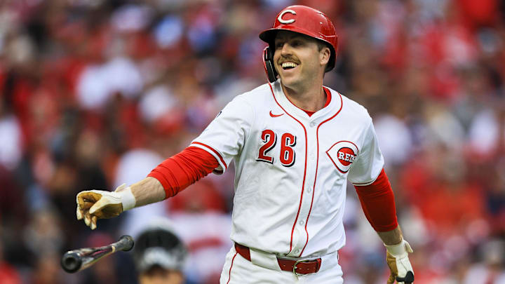 Mar 27, 2025; Cincinnati, Ohio, USA; Cincinnati Reds pinch hitter Jacob Hurtubise (26) reacts after getting hit on a wild pitch in the ninth inning against the San Francisco Giants at Great American Ball Park. Mandatory Credit: Katie Stratman-Imagn Images