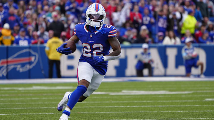 Buffalo Bills running back Ray Davis (22) runs with the ball for a touchdown against the Miami Dolphins during the second half at Highmark Stadium. Buffalo Bills running back Ray Davis (22) runs with the ball for a touchdown against the Miami Dolphins during the second half at Highmark Stadium.