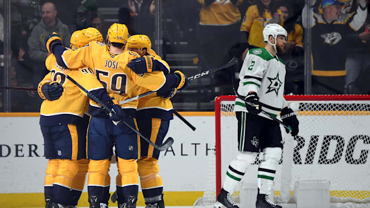 Dec 23, 2023; Nashville, Tennessee, USA; Nashville Predators players celebrate after a goal by