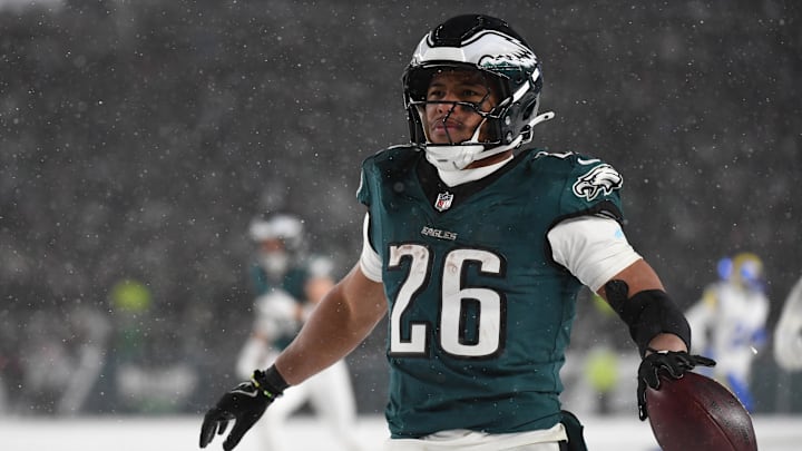Jan 19, 2025; Philadelphia, Pennsylvania, USA; Philadelphia Eagles running back Saquon Barkley (26) celebrates after scoring a touchdown against the Los Angeles Rams in the second half in a 2025 NFC divisional round game at Lincoln Financial Field. Mandatory Credit: Eric Hartline-Imagn Images Jan 19, 2025; Philadelphia, Pennsylvania, USA; Philadelphia Eagles running back Saquon Barkley (26) celebrates after scoring a touchdown against the Los Angeles Rams in the second half in a 2025 NFC divisional round game at Lincoln Financial Field. Mandatory Credit: Eric Hartline-Imagn Images