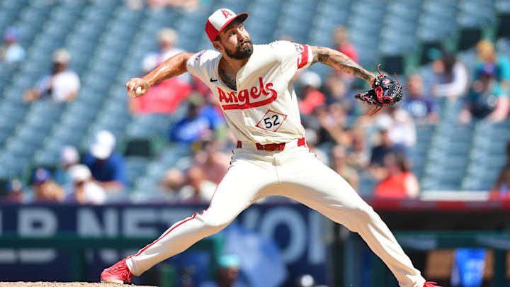 Jul 14, 2024; Anaheim, California, USA; Los Angeles Angels pitcher Hans Crouse (52) throws against the Seattle Mariners during the eighth inning at Angel Stadium. Mandatory Credit: Gary A. Vasquez-Imagn Images Jul 14, 2024; Anaheim, California, USA; Los Angeles Angels pitcher Hans Crouse (52) throws against the Seattle Mariners during the eighth inning at Angel Stadium. Mandatory Credit: Gary A. Vasquez-Imagn Images