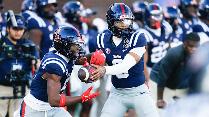 Dec 20, 2025; Oxford, MS, USA; Mississippi Rebels quarterback Trinidad Chambliss (6) and running back Kewan Lacy (5) warm up prior to a game against the Tulane Green Wave at Vaught-Hemingway Stadium. Mandatory Credit: Petre Thomas-Imagn Images