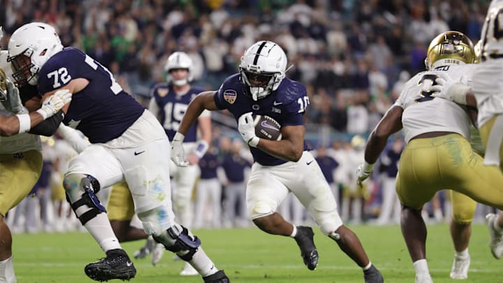 Penn State Nittany Lions running back Nicholas Singleton (10) runs the ball in the second half against the Notre Dame Fighting Irish in the Orange Bowl at Hard Rock Stadium. Penn State Nittany Lions running back Nicholas Singleton (10) runs the ball in the second half against the Notre Dame Fighting Irish in the Orange Bowl at Hard Rock Stadium.
