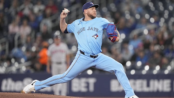 Apr 30, 2025; Toronto, Ontario, CAN; Toronto Blue Jays starting pitcher Yariel Rodriguez (29) pitches to the Boston Red Sox during the first inning at Rogers Centre.