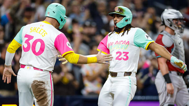 Sep 26, 2025; San Diego, California, USA; San Diego Padres right fielder Fernando Tatis Jr. (23) celebrates with left fielder Gavin Sheets (30) after hitting a grand slam home run during the fourth inning Arizona Diamondbacks at Petco Park. Mandatory Credit: David Frerker-Imagn Images Sep 26, 2025; San Diego, California, USA; San Diego Padres right fielder Fernando Tatis Jr. (23) celebrates with left fielder Gavin Sheets (30) after hitting a grand slam home run during the fourth inning Arizona Diamondbacks at Petco Park. Mandatory Credit: David Frerker-Imagn Images