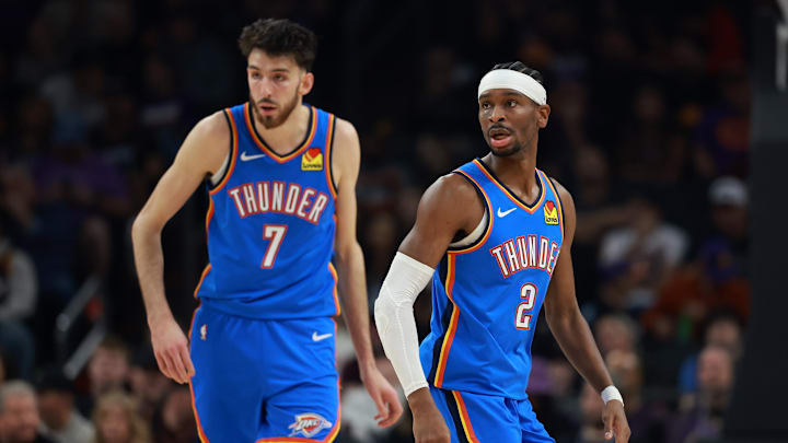 Jan 4, 2026; Phoenix, Arizona, USA; Oklahoma City Thunder guard Shai Gilgeous-Alexander (2) and center Chet Holmgren (7) against the Phoenix Suns at Mortgage Matchup Center. Jan 4, 2026; Phoenix, Arizona, USA; Oklahoma City Thunder guard Shai Gilgeous-Alexander (2) and center Chet Holmgren (7) against the Phoenix Suns at Mortgage Matchup Center.