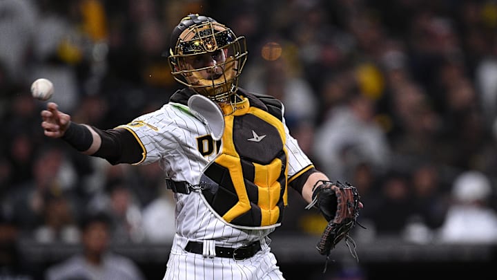 Mar 30, 2023; San Diego, California, USA; San Diego Padres catcher Austin Nola (26) throws to first base to force out Colorado Rockies third baseman Elehuris Montero (not pictured) during the third inning at Petco Park. Mar 30, 2023; San Diego, California, USA; San Diego Padres catcher Austin Nola (26) throws to first base to force out Colorado Rockies third baseman Elehuris Montero (not pictured) during the third inning at Petco Park.