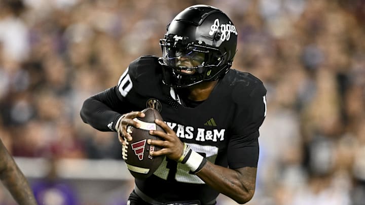 Oct 26, 2024; College Station, Texas, USA; Texas A&M Aggies quarterback Marcel Reed (10) runs the ball in the fourth quarter against the LSU Tigers at Kyle Field. Mandatory Credit: Maria Lysaker-Imagn Images. 