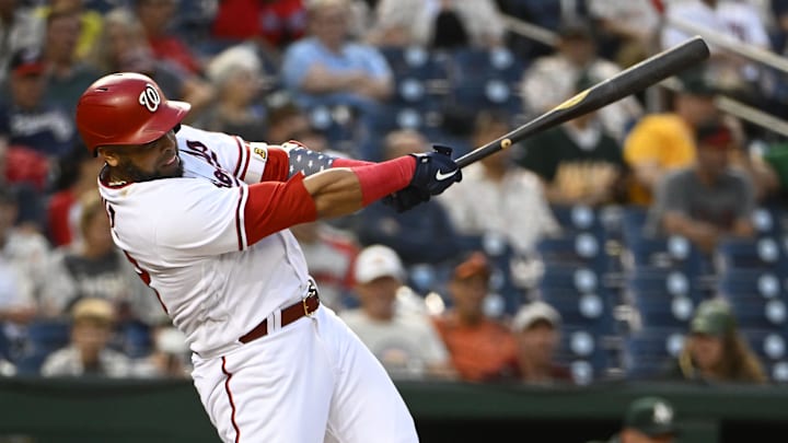 Aug 30, 2022; Washington, District of Columbia, USA; Washington Nationals designated hitter Nelson Cruz (23) hits an RBI sacrifice fly against the Oakland Athletics during the first inning at Nationals Park. 