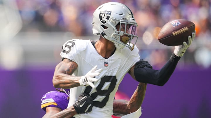 Aug 10, 2024; Minneapolis, Minnesota, USA; Las Vegas Raiders cornerback Jack Jones (18) intercepts a pass from Minnesota Vikings quarterback J.J. McCarthy (9) in the second quarter at U.S. Bank Stadium. Aug 10, 2024; Minneapolis, Minnesota, USA; Las Vegas Raiders cornerback Jack Jones (18) intercepts a pass from Minnesota Vikings quarterback J.J. McCarthy (9) in the second quarter at U.S. Bank Stadium.