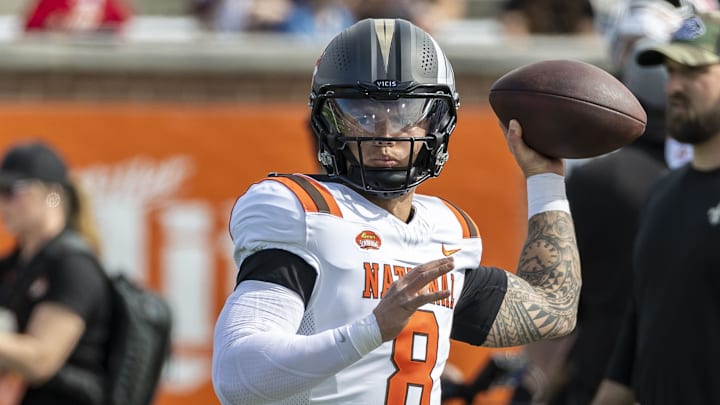 National team quarterback Dillon Gabriel of Oregon warms up before the 2025 Senior Bowl football game against the American Team.