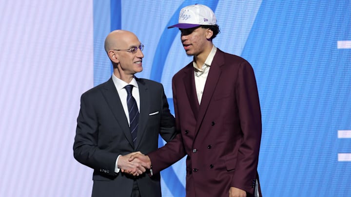 Jun 25, 2025; Brooklyn, NY, USA;  Will Riley stands with NBA commissioner Adam Silver after being selected as the 21st pick by the Utah Jazz in the first round of the 2025 NBA Draft at Barclays Center. Mandatory Credit: Brad Penner-Imagn Images
