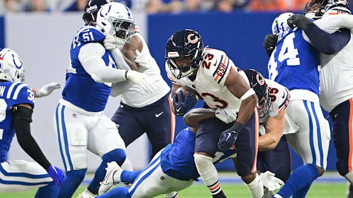 Roschon Johnson powers ahead against the Colts on one of his eight carries. There is a report they'll utilize him more now.