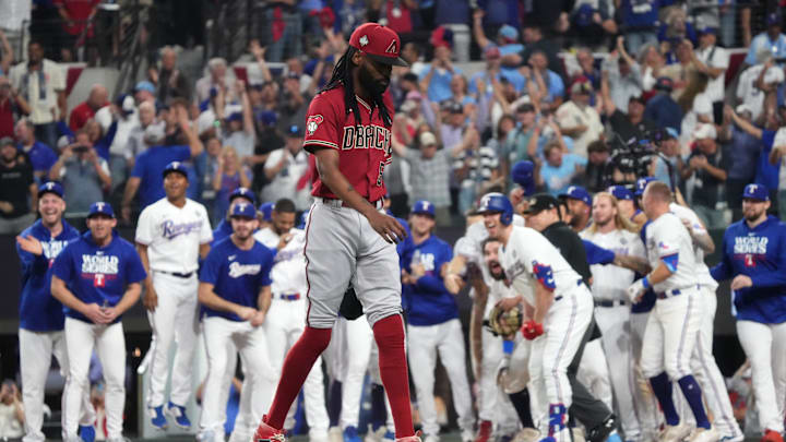 Arizona Diamondbacks relief pitcher Miguel Castro (50) walks off the field after a walk-off home run