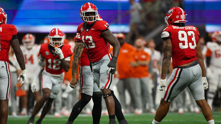 Aug 31, 2024; Atlanta, Georgia, USA; Georgia Bulldogs defensive lineman Mykel Williams (13) celebrates after a tackle against the Clemson Tigers in the third quarter at Mercedes-Benz Stadium. Mandatory Credit: Brett Davis-Imagn Images