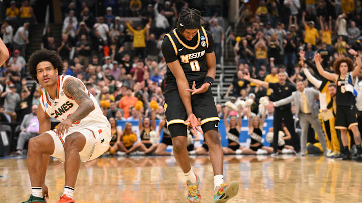 Mar 20, 2026; St. Louis, MO, USA; Missouri Tigers guard Anthony Robinson II (0) reacts after shooting a three pointer during the second half against the Miami (FL) Hurricanes during a first round game of the men's 2026 NCAA Tournament at Enterprise Center. Mandatory Credit: Jeff Curry-Imagn Images Mar 20, 2026; St. Louis, MO, USA; Missouri Tigers guard Anthony Robinson II (0) reacts after shooting a three pointer during the second half against the Miami (FL) Hurricanes during a first round game of the men's 2026 NCAA Tournament at Enterprise Center. Mandatory Credit: Jeff Curry-Imagn Images
