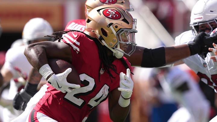 Oct 6, 2024; Santa Clara, California, USA; San Francisco 49ers running back Jordan Mason (24) carries the ball against the Arizona Cardinals during the second quarter at Levi's Stadium. Oct 6, 2024; Santa Clara, California, USA; San Francisco 49ers running back Jordan Mason (24) carries the ball against the Arizona Cardinals during the second quarter at Levi's Stadium.