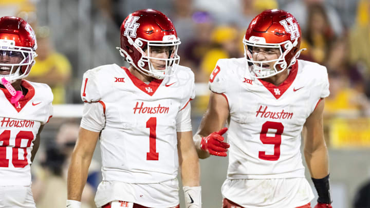 Houston Cougars quarterback Conner Weigman (1) and tight end Tanner Koziol (9) against the Arizona State Sun Devils at Mountain America Stadium.