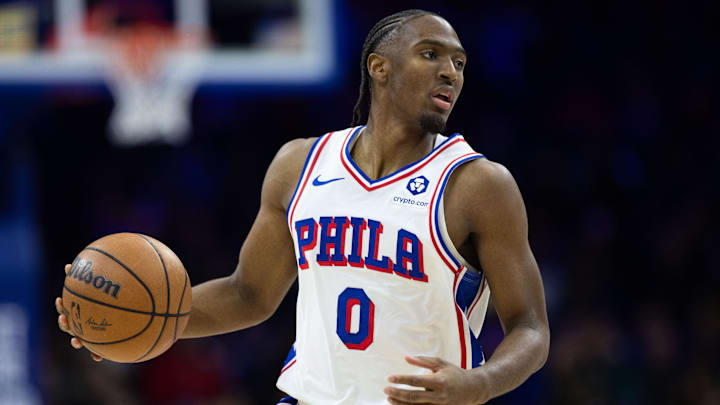 Jan 15, 2025; Philadelphia, Pennsylvania, USA; Philadelphia 76ers guard Tyrese Maxey (0) controls the ball against the New York Knicks during the third quarter at Wells Fargo Center. Mandatory Credit: Bill Streicher-Imagn Images