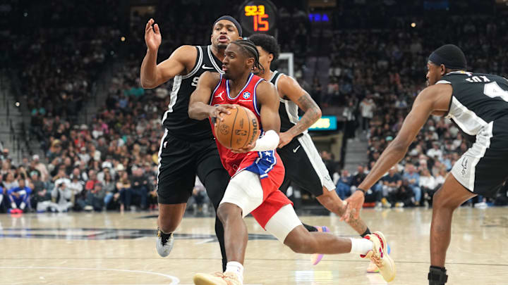 Apr 6, 2026; San Antonio, Texas, USA; Philadelphia 76ers guard Tyrese Maxey (0) drives to the basket past San Antonio Spurs forward Keldon Johnson (3) during the second half at Frost Bank Center. Mandatory Credit: Scott Wachter-Imagn Images Apr 6, 2026; San Antonio, Texas, USA; Philadelphia 76ers guard Tyrese Maxey (0) drives to the basket past San Antonio Spurs forward Keldon Johnson (3) during the second half at Frost Bank Center. Mandatory Credit: Scott Wachter-Imagn Images
