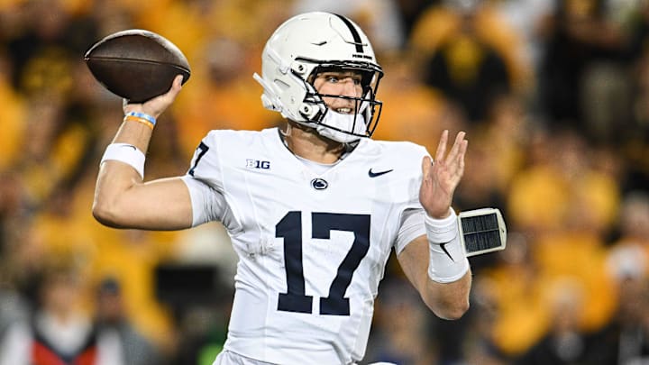 Penn State Nittany Lions quarterback Ethan Grunkemeyer (17) throws a pass against the Iowa Hawkeyes during the first quarter at Kinnick Stadium. Penn State Nittany Lions quarterback Ethan Grunkemeyer (17) throws a pass against the Iowa Hawkeyes during the first quarter at Kinnick Stadium.