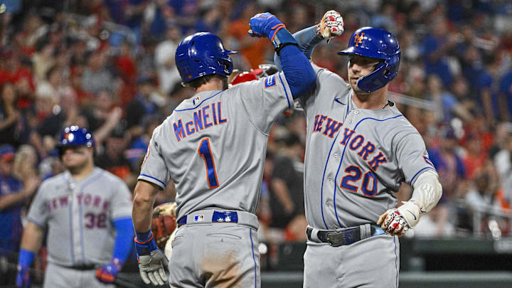 Aug 19, 2023; St. Louis, Missouri, USA;  New York Mets first baseman Pete Alonso (20) celebrates with second baseman Jeff McNeil (1) after hitting a two run home run against the St. Louis Cardinals during the seventh inning at Busch Stadium. Mandatory Credit: Jeff Curry-Imagn Images