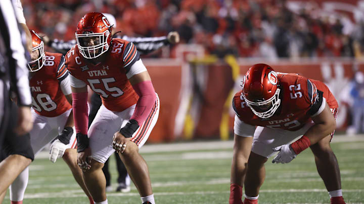 Oct 11, 2025; Salt Lake City, Utah, USA; Utah Utes offensive lineman Spencer Fano (55) and Utah Utes offensive lineman Michael Mokofisi (52) wait for the play during the third quarter of the game against the Arizona State Sun Devils at Rice-Eccles Stadium. Mandatory Credit: Rob Gray-Imagn Images