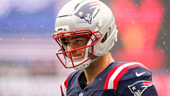 Dec 14, 2025; Foxborough, Massachusetts, USA; New England Patriots quarterback Drake Maye (10) warms up before the start of the game against the Buffalo Bills at Gillette Stadium.