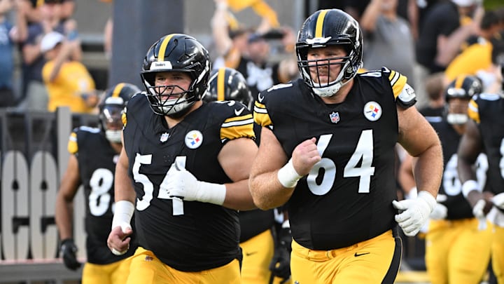 Aug 16, 2025; Pittsburgh, Pennsylvania, USA; Pittsburgh Steelers center Zach Frazier (54) and  guard Max Scharping (64) take the field for a game against the Tampa Bay Buccaneers at Acrisure Stadium. Mandatory Credit: Barry Reeger-Imagn Images