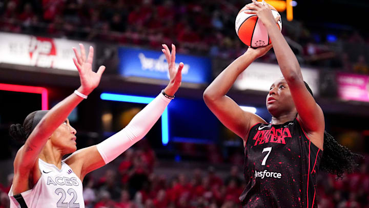 Las Vegas Aces center A'ja Wilson (22) defends Indiana Fever forward Aliyah Boston (7) during Game 4 of the WNBA semifinals on Sunday, Sept. 28, 2025, at Gainbridge Fieldhouse in Indianapolis. The Fever defeated the Aces 90-83. Las Vegas Aces center A'ja Wilson (22) defends Indiana Fever forward Aliyah Boston (7) during Game 4 of the WNBA semifinals on Sunday, Sept. 28, 2025, at Gainbridge Fieldhouse in Indianapolis. The Fever defeated the Aces 90-83.