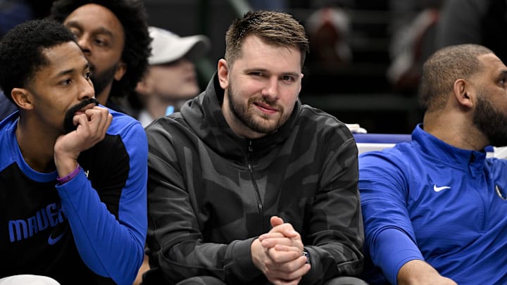 Jan 27, 2025; Dallas, Texas, USA; Dallas Mavericks guard Luka Doncic looks on from the team bench during the second quarter against the Washington Wizards at the American Airlines Center. Mandatory Credit: Jerome Miron-Imagn Images