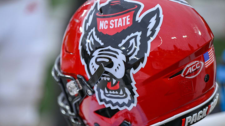 Nov 11, 2023; Winston-Salem, North Carolina, USA; The North Carolina State Wolfpack helmet rests on the bench during the second half against the Wake Forest Demon Deacons at Allegacy Federal Credit Union Stadium. Mandatory Credit: William Howard-Imagn Images Nov 11, 2023; Winston-Salem, North Carolina, USA; The North Carolina State Wolfpack helmet rests on the bench during the second half against the Wake Forest Demon Deacons at Allegacy Federal Credit Union Stadium. Mandatory Credit: William Howard-Imagn Images