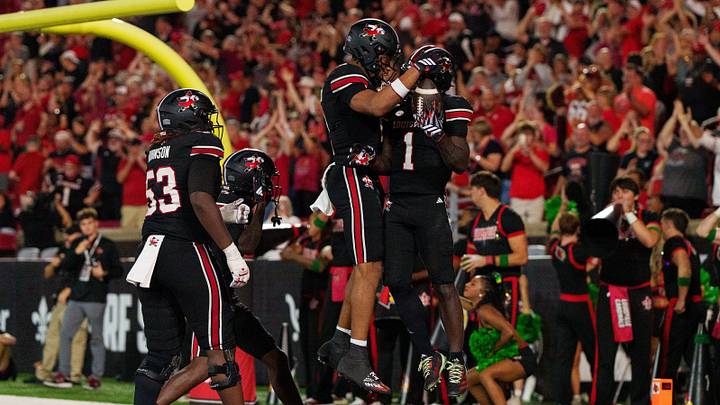 Oct 9, 2026; Louisville, Kentucky, USA;  Louisville Cardinals running back Isaac Brown (1) celebrates after scoring a touchdown during the fourth quarter of the game against the Florida State Seminoles at L&N Federal Credit Union Stadium.  Mandatory Credit: Chris Carter-Imagn Images