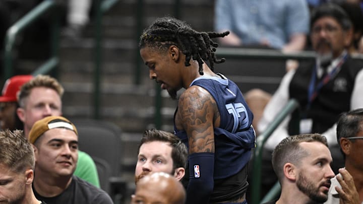 Memphis Grizzlies guard Ja Morant (12) walks off the court during the second quarter against the Dallas Mavericks at the American Airlines Center. 