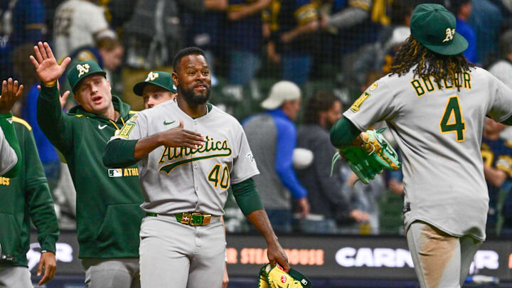 Apr 19, 2025; Milwaukee, Wisconsin, USA;  Athletics starting pitcher Luis Severino (40) celebrates after beating the Milwaukee Brewers at American Family Field. Mandatory Credit: Benny Sieu-Imagn Images